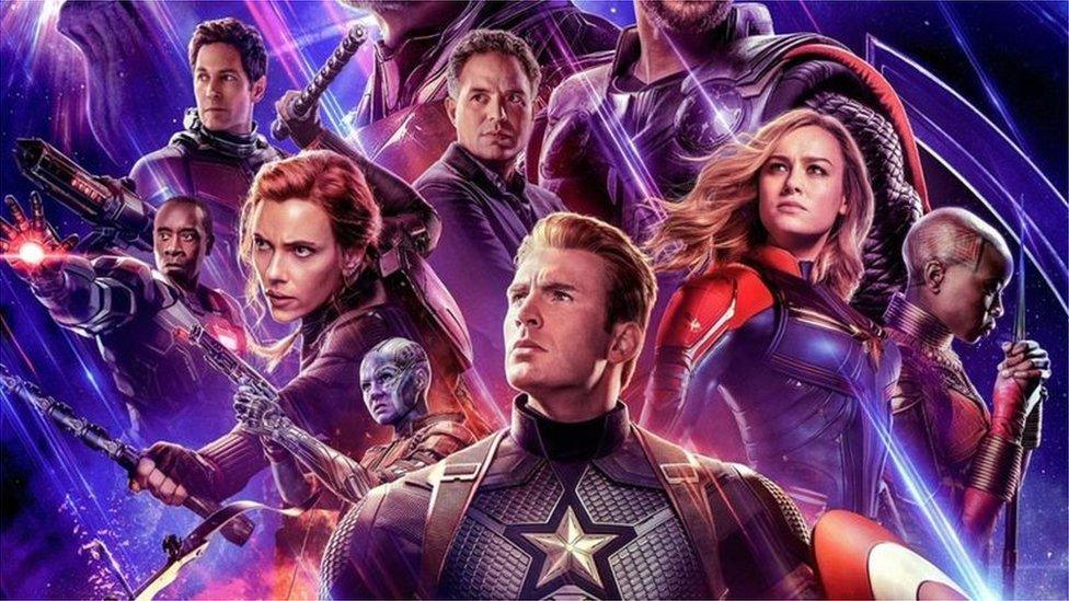The Avengers: Endgame poster showing the core MCU heroes against a purple and blue cosmic backdrop